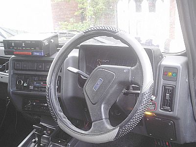 The drivers cabin of a london taxi