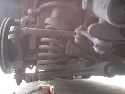 Fairway front suspension showing coil spring and wishbones