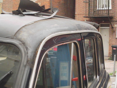 Removing the vinyl roof on a old taxi